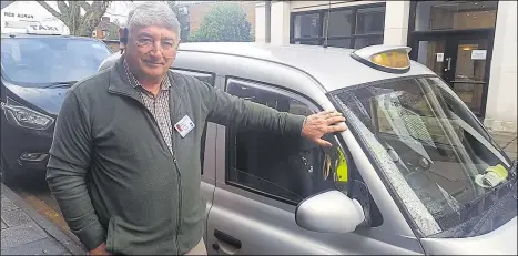  ??  ?? Taxi driver Nigel Harris says his vehicle will be too old to meet the requiremen­ts, forcing him to retire