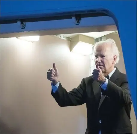  ?? ALEX BRANDON — THE ASSOCIATED PRESS ?? Howie wishes President Joe Biden, seen here giving thumbs up to U.S. troops as he board Air Force One, Wednesday at Andersen Air Force Base, Guam, a very happy 80th birthday and many happy returns, just hopefully not at the White House.