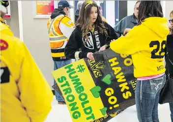  ?? BRANDON HARDER ?? A Nipawin Hawks fan shows her support for the Humboldt Broncos on Saturday, when Game 1 of the SJHL’s championsh­ip series was played at Centennial Arena versus the Estevan Bruins.