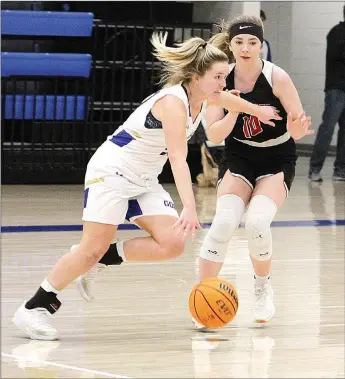  ??  ?? Lady Blackhawk senior Ravin Cawthon watches the ball closely as a Lady Goblin works toward the goal Friday, Jan. 29.