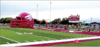  ?? MARK HUMPHREY ENTERPRISE-LEADER ?? Lincoln unveiled a new inflatable tunnel for the football team to run through while entering the field for a game during Friday’s Meet the Wolves community event. Wolfpack Stadium drew a good crowd of fans eager to get the fall high school sports season underway.