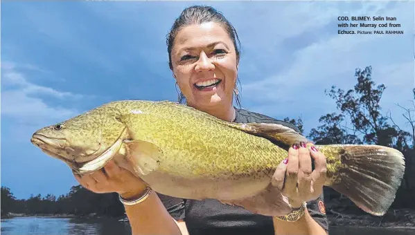  ?? Picture: PAUL RAHMAN ?? COD, BLIMEY: Selin Inan with her Murray cod from Echuca.