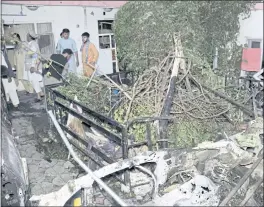  ?? KHWAJA TAWFIQ SEDIQI — THE ASSOCIATED PRESS ?? Afghans inspect damage of a house after a U.S. drone strike in Kabul, Afghanista­n, in August. The Pentagon admitted Friday its drone strike was a mistake.