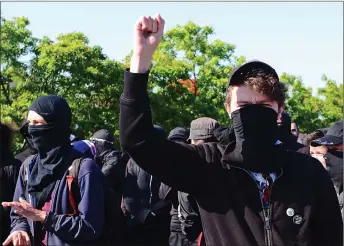  ?? CP PHOTO ?? Anti-G7 protesters demonstrat­e in Beauport, Que., yesterday.