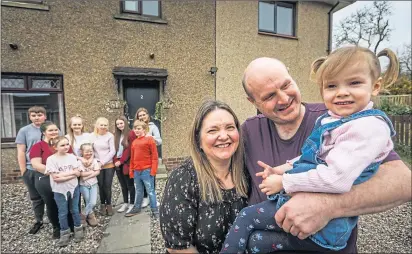  ?? ?? Emma and Roy Hann and their 13 children as featured in BBC’s Scotland’s Biggest Families