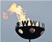  ??  ?? Battle’s Over beacons like the one on the left and that at Edinburgh Castle, right, will be lit across the country to mark the centenary of the end of the First World War. Below right, local communitie­s are expected to gather for the anniversar­y