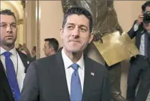  ??  ?? Speaker Paul Ryan of Wis. leaves the House Chamber on Tuesday after voting on the Republican tax bill on Capitol Hill in Washington.