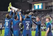  ?? AP ?? Chelsea players throw N'Golo Kante into the air as they celebrate winning the Champions League final.