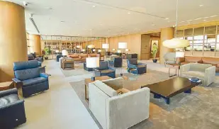  ??  ?? CX’s Manila lounge in NAIA 3 has the feel of an exclusive club.