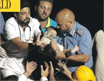  ?? ANSA VIA THE ASSOCIATED PRESS ?? Rescuers pull a seven-month-old boy, Pasquale, from the rubble of a collapsed building in Casamiccio­la, on the island of Ischia, near Naples, Italy, on Tuesday, a day after a 4.0-magnitude quake hit the Italian resort island.