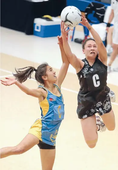  ?? Photo: MICHAEL BRADLEY/FAIRFAX NZ ?? High flier: St Mary’s centre Whitney Souness beats Mt Albert Grammar’s Destiny Grace to the ball in the national secondary schools final in Auckland last weekend.