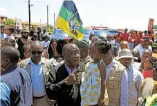  ?? Thapelo Morebudi ?? Register to vote: President Cyril Ramaphosa holds Ndivho Ramulifho at Protea Glen in Soweto on Saturday when he encouraged residents to register to vote in the general election this year. /