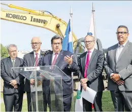  ?? JOHN MAHONEY ?? Montreal Mayor Denis Coderre, flanked by, from left, city councillor Yves Gignac, Finance Minister Carlos Leitão, Municipal Affairs Minister Martin Coiteux and Pierrefond­s-Roxboro borough Mayor Jim Beis.