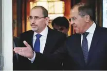  ?? Reuters ?? Russia’s Lavrov and Jordan’s Safadi before their talks in Moscow yesterday.