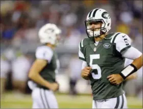  ?? BILL KOSTROUN — THE ASSOCIATED PRESS ?? New York Jets quarterbac­k and Penn State alum Christian Hackenberg (5) finished with a touchdown and an intercepti­on during his preseason NFL debut on Saturday.