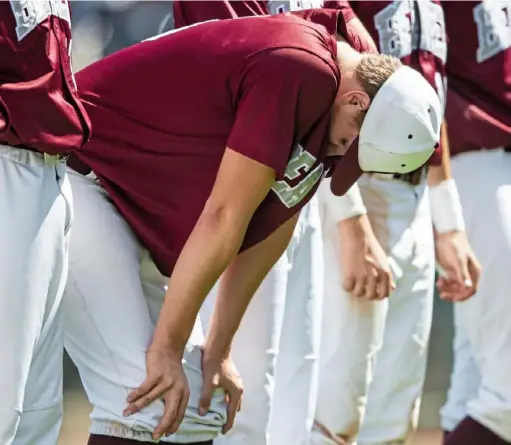  ?? Caitlin Lee/Post-Gazette ?? Beaver’s Mason Rose hangs his head after falling to Selinsgrov­e in the PIAA 4A title game Friday at Penn State.