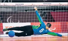  ??  ?? Brazil's Josemarcio Sousa dives to defend during a goalball match against USA at the Tokyo Paralympic­s at Makuhari Messe Hall.