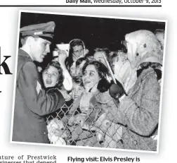  ??  ?? Flying visit: Elvis Presley is mobbed by young fans at Prestwick Airport in 1960
