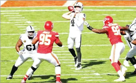  ?? AFP ?? Raiders quarterbac­k Derek Carr threw for 347 yards and three touchdowns on Sunday to beat Kansas City 40-32.