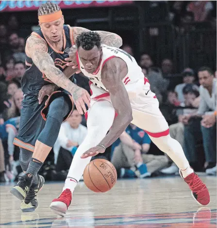  ?? MARY ALTAFFER THE ASSOCIATED PRESS ?? New York Knicks forward Michael Beasley, left, and Toronto Raptors forward Pascal Siakam, right, vie for a loose ball Sunday in New York.