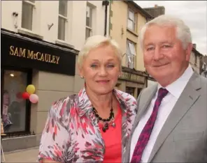  ??  ?? Leslie and Sam McCauley outside their Enniscorth­y premises.