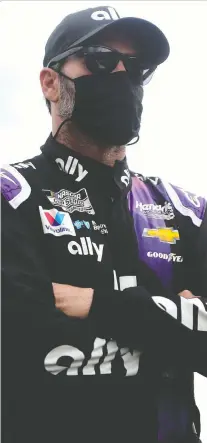  ?? GETTY IMAGES ?? Jimmie Johnson, seen last week at Pocono Raceway, wasn’t showing symptoms when he received a positive COVID-19 test.