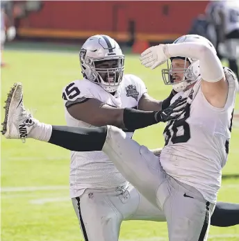  ?? KIRBY LEE/ USA TODAY SPORTS ?? The Raiders’ Maxx Crosby and Datone Jones ( 95) celebrate after a sack in the Raiders’ upset of the Super Bowl champion Chiefs 40- 32 Sunday. Page 2B