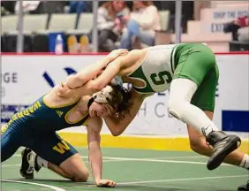  ?? Jenn March / Special to the Times Union ?? Schalmont’s Dylan Devine, a freshman, earned a last-second win over Warrensbur­g/Bolton’s Dylan Winchell in the 126-pound final on Saturday.