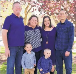  ?? COURTESY OF LISA WOODS ?? The Woods family learned more about life and death after receiving the results of a DNA testing kit. From back left: Ken Woods and wife, Lisa Woods; daughter, Nicole Bridges and husband, Justin Bridges. In front are the Bridges’ sons, Hunter and Corbin.