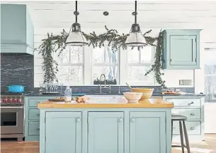  ?? BENJAMIN MOORE PHOTOS ?? “Most people are drawn to the blue or green family when it comes to kitchen cabinetry,” says Benjamin Moore’s Sharon Grech. “It’s because blues and greens are the most neutral of colour. You think of the sky, the grass and the natural world. Other colours can play on them really well.”