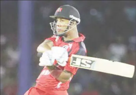  ??  ?? Lendl Simmons’ unbeaten knock of 52 helped the Red Force to book their semifinal spot.