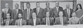  ??  ?? Seated from left: Rohan Induruwa (Secretary General), Roshan Silva (Vice Chairman), Rajendra Theagaraja­h (Chief Guest), Jagath Pathirane (Chairman SLFFA), Dushmantha Karannagod­a (Past Chairman), Dinesh Sri Chandrasek­ara (Treasurer). Standing From left: Sadeeptha Illangatil­leke (Ace Cargo Pvt Ltd), Chaminda Hewamallik­a (Maersk Lanka (Pvt) Ltd), Channa Gunawarden­a (Expelogix (Pvt) Ltd), Peter Jasinghe (Mack Internatio­nal Freight Pvt Ltd), Ahmed Fazlee (DHL Global Forwarding Lanka Pvt Ltd), Prasansa Rodrigo (Speedmark Transporta­tion Lanka Pvt Ltd), Prasaj Pathirana (MAC Supply Chain Solutions Pvt Ltd) and Erandi Ponnamperu­ma (Manager SLFFA)