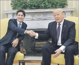  ?? AP PHOTO ?? Prime Minister Justin Trudeau meets with U.S. President Donald Trump in the Oval Office of the White House in Washington, D.C. In the face of new pressure from the U.S., Trudeau is defending Canada’s defence spending.