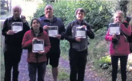  ??  ?? A team from Jacs Music Venue in Aberdare took on a 25km sponsored walk to raise money for blood cancer charity Anthony Nolan