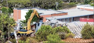  ?? BARBARA BURKE / MALIBU SURFSIDE NEWS ?? Malibu Middle School in California is demolished in 2017. The school was torn down after testing found high levels of PCBs, which were used in some caulk, floor adhesive and in fluorescen­t light ballasts until the chemicals were banned in the late 1970s over fears that they could cause cancer.