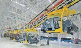  ?? REUTERS FILE ?? The Sanandhans­alpur belt has emerged as a major auto hub, which is competing with the Sriperumbu­duroragada­m belt in Tamil Nadu for government push and foreign investment­s.