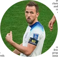  ?? ?? England captain Harry Kane wears an armband with the sign ‘‘No discrimina­tion’’ during his team’s win over Iran. Kane was not allowed to wear a rainbow One Love armband.