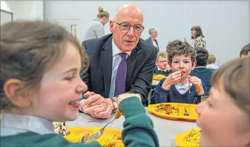  ??  ?? Deputy First Minister enjoys lunch at St Johns primary in Edinburgh