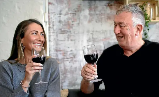  ?? AP ?? Peter Peacock, 68, and Gypsy Diamond, 36, share a laugh over a glass of Shiraz each, their favourite type of wine, in Melbourne. Peacock, who donated sperm anonymousl­y around 1980, was recently contacted by Diamond, his biological daughter, after a new...