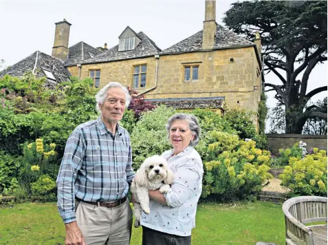  ?? ?? Jane Saltmarsh, with her husband, Peter, said that she was ‘thunderstr­uck’ that anyone would want to sell plots from a historic field in the Cotswolds village of Weston-sub-Edge