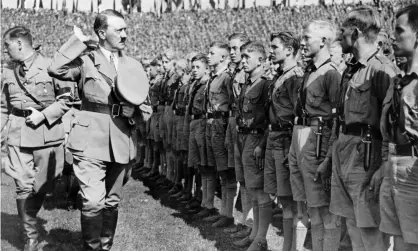  ?? Photograph: Getty Images ?? Hitler arrives at the Nuremberg Rally in 1934, the year the Nazis cleansed the phonetic table of its Jewish names.