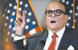  ?? JACQUELYN MARTIN/AP ?? Former New York City Mayor Rudy Giuliani met with state lawmakers last week in Arizona, Georgia and Michigan in an effort to help President Trump subvert his election loss.