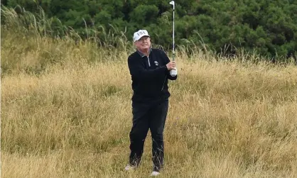  ??  ?? Donald Trump plays a round of golf at his course in Turnberry, Scotland. Photograph: Leon Neal/Getty Images