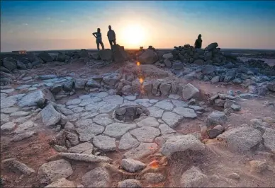  ?? ALEXIS PANTOS / REUTERS ?? The stone structure containing the fireplace where charred remains of 14,500-year-old bread were found in Jordan.