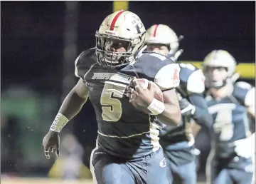  ?? Steven Eckhoff / RN-T ?? Pepperell’s Tae Hammond (5) sprints down the field for an early touchdown run against Banks County during a Class AA first round state playoff game Friday at Dragon Stadium in Lindale. The Dragons won 57-0.