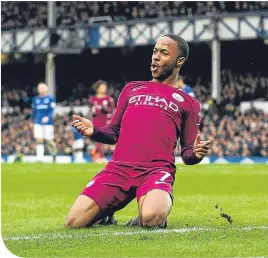  ??  ?? Raheem Sterling is all smiles after scoring Manchester City’s third