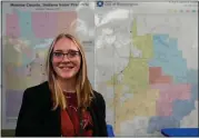  ?? AP PHOTO/ MICHAEL CONROY ?? Kylie Moreland, the Monroe County Elections Supervisor, poses in her office in Bloomingto­n, Ind., Tuesday, Feb. 13, 2024.