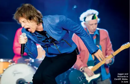  ??  ?? Jagger and Richards in Cardiff, Wales,in June