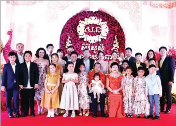  ?? FACEBOOK ?? Prime Minister Hun Sen poses with his family while wishing Cambodians a happy Khmer New Year. In a separate statement, he congratula­ted his government for preventing a ‘colour revolution’.