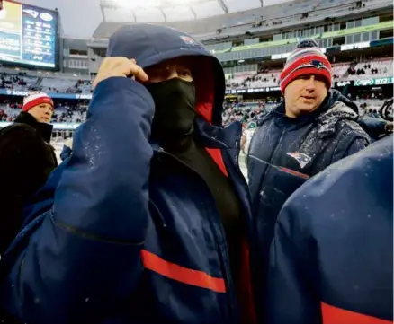  ?? MATTHEW J. LEE/GLOBE STAFF ?? Bill Belichick appeared to be an anonymous face in the crowd as he exited Gillette Stadium.